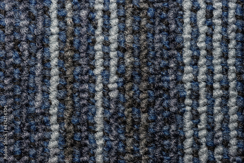 Fototapeta premium Seamless close up of monochrome grey carpet texture background from above.