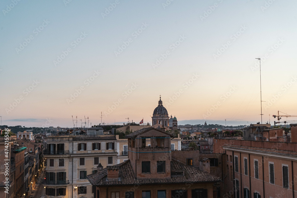 view of the city of Rome at sunset