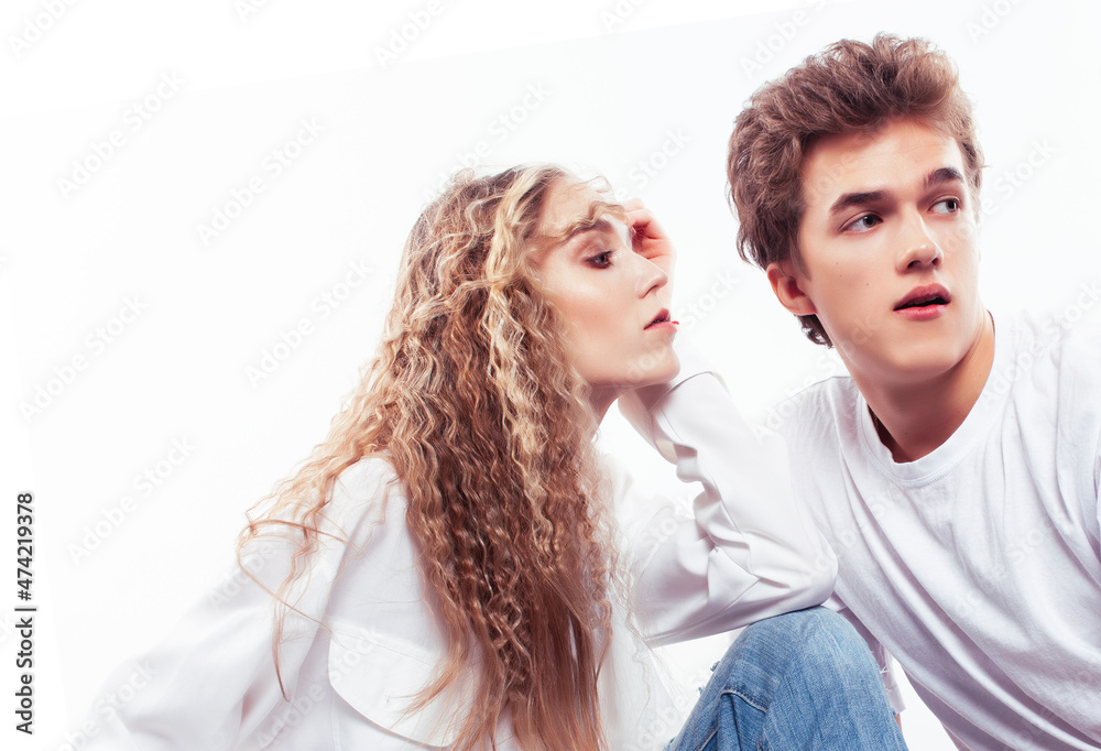 young attractive couple together having fun happy smiling isolated on white background, emotional posing, lifestyle people concept young attractive couple together having fun happy smiling isolated on white background, emotional posing, lifestyle people concept
