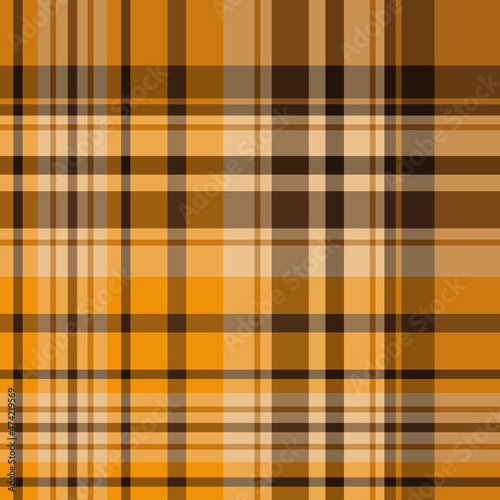 Seamless pattern in glorious warm yellow, brown and beige colors for plaid, fabric, textile, clothes, tablecloth and other things. Vector image.