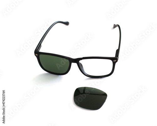 old damaged sunglasses on white background