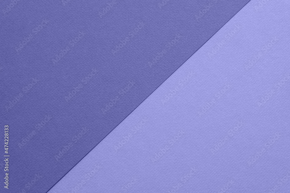 Very peri color of the year 2022. Fashionable pantone color backdrop divided diagonally. Texture of colored paper for watercolor and pastel. Modern luxury background or mock up, copy space