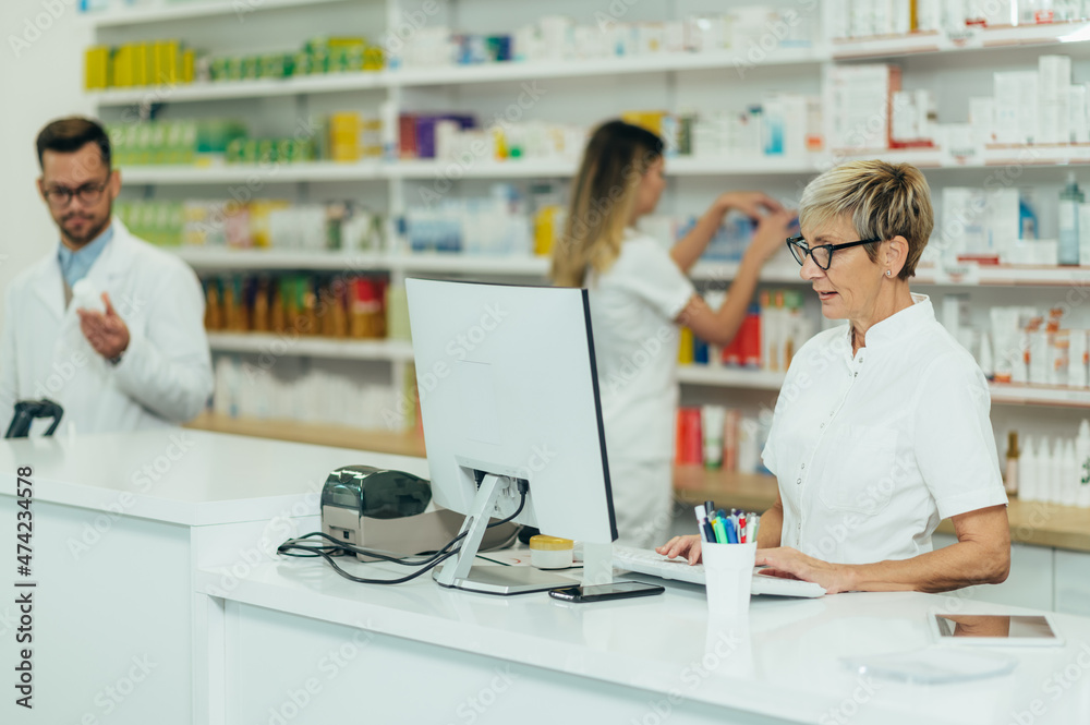 Senior female pharmacist working in a pharmacy