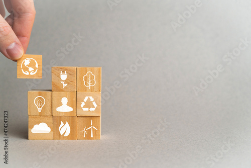 The concept of caring for nature by using ecologically clean energy with copy space.