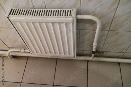 Wallpaper Mural hot water radiator against the wall Torontodigital.ca