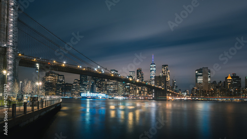 Night time view of Brooklyn Bridge (from Dumbo) and Lower Manhattan Skyline at Blue Hour, New York City © Timo Günthner