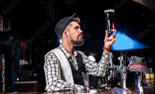 Bartender mixes a cocktail at the pothouse photo