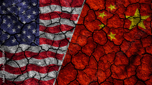 Trade war between United states of america versus China . flag on cracked wall background . Confliction and crisis concept .