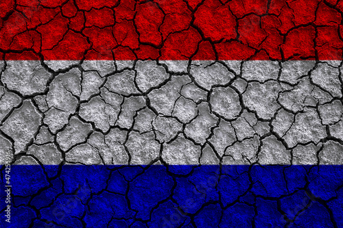 Netherlands flag pattern on the crack soil texture ,retro vintage style