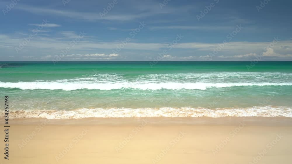 Landscape view beach sea and sand on summer.Waves smooth splashing soft waters. Landscape view beach sea and sand on summer.Waves smooth splashing soft waters.