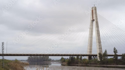 Bridge with cars over Guadiana river in Badajoz, Spain