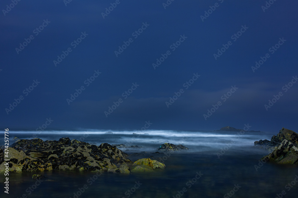 Dramatic and mystical Atlantic Ocean at night at long run. Dramatic and mystical Atlantic Ocean at night at long run.