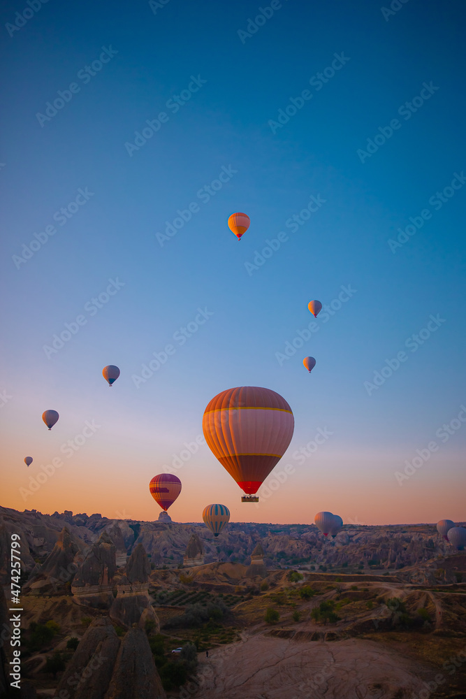 Bright hot air balloons in sky of Cappadocia, Turkey