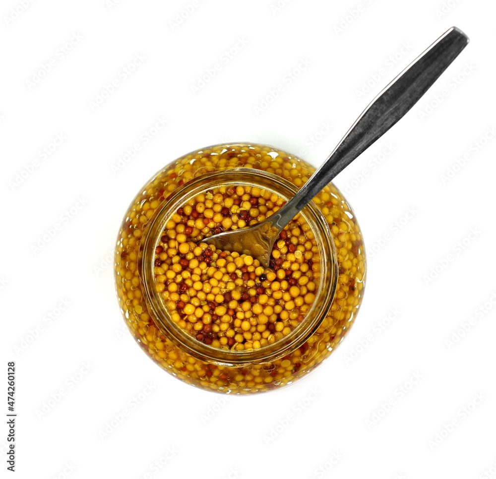 Whole grain mustard. French mustard isolated on white background.