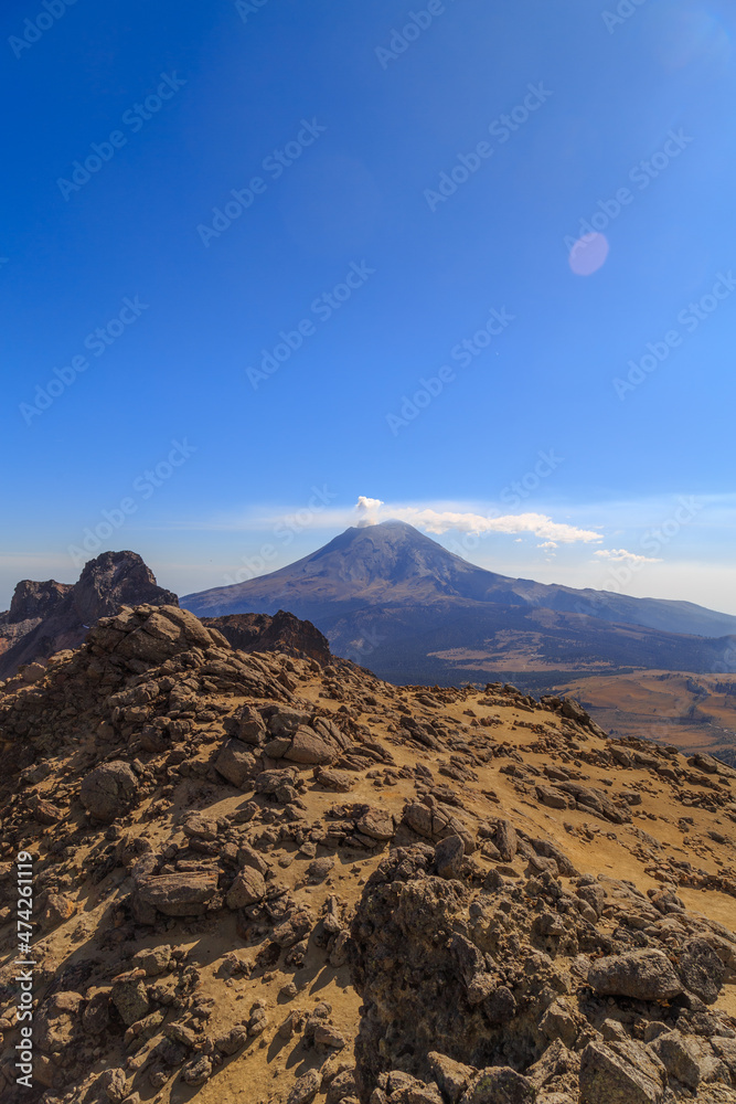 The active Popocatepetl volcano in Mexico as seen from Iztaccihuatl volcano
