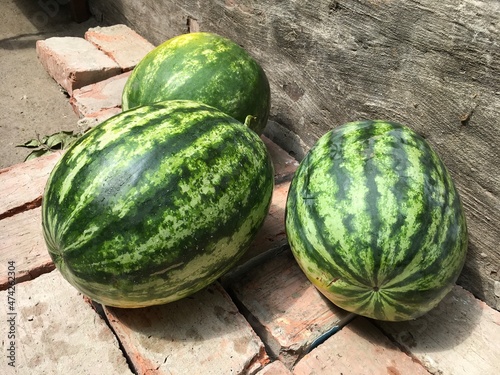 three big delicious ripe sweet watermelons