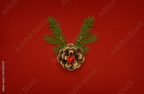 Pine cone with golden glitt...