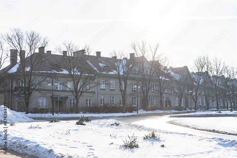 Directorate estate in Chelm, Poland, Osiedle Dyrekcji w Chełmie, Chełm City in winter, tenement houses, sunny winter day - obrazy, fototapety, plakaty 