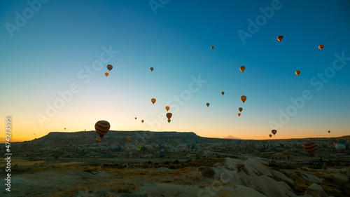 Cappadocia balloons. Hot air balloons in Goreme at sunrise.