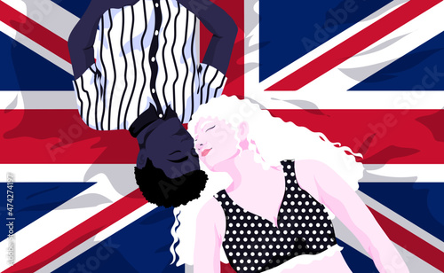Two diverse people laying on UK flag