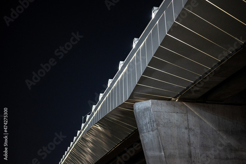 Metal and concrete details on underside of bridge, lights, lines and textures provide a great background.