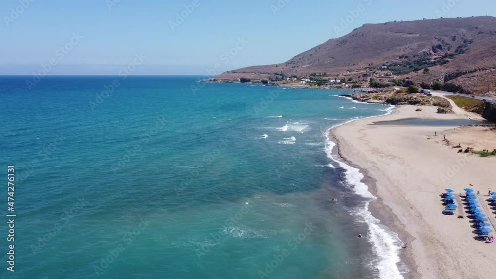 Aerial Nature Greek Landscape with Sea Bay and Empty Sand Beach. Beautiful Vacation and Tourism Destination in Crete, Greece. Aerial Nature Greek Landscape with Sea Bay and Empty Sand Beach. Beautiful Vacation and Tourism Destination in Crete, Greece.