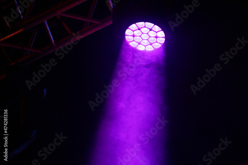 Close-up of bright purple stage light. Concert equipment © Евгений Вдовин