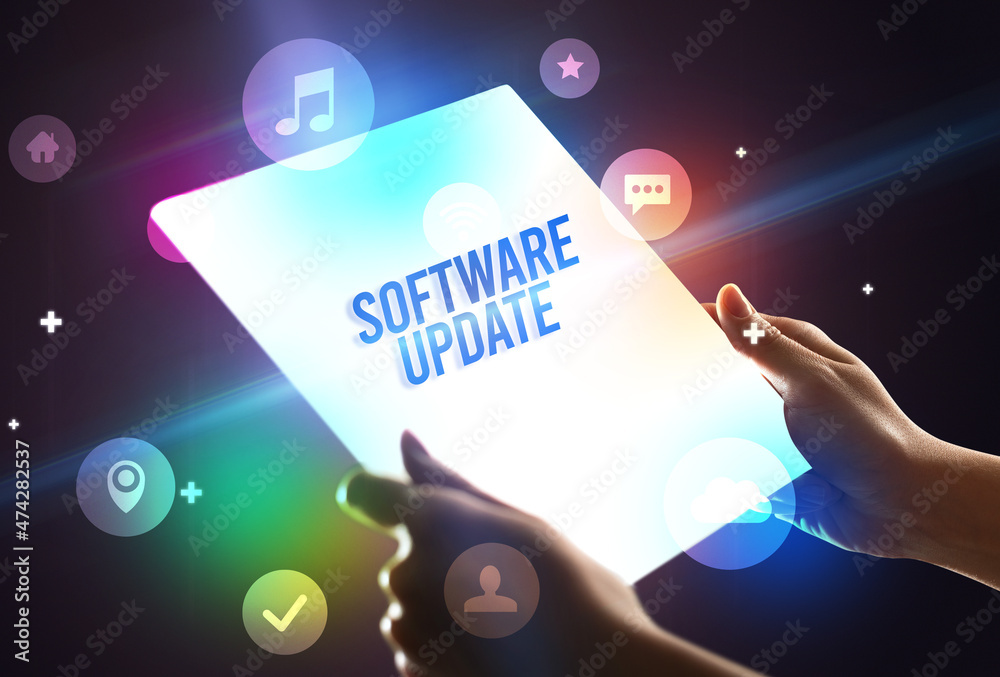 Holding futuristic tablet, new media concept Holding futuristic tablet, new media concept
