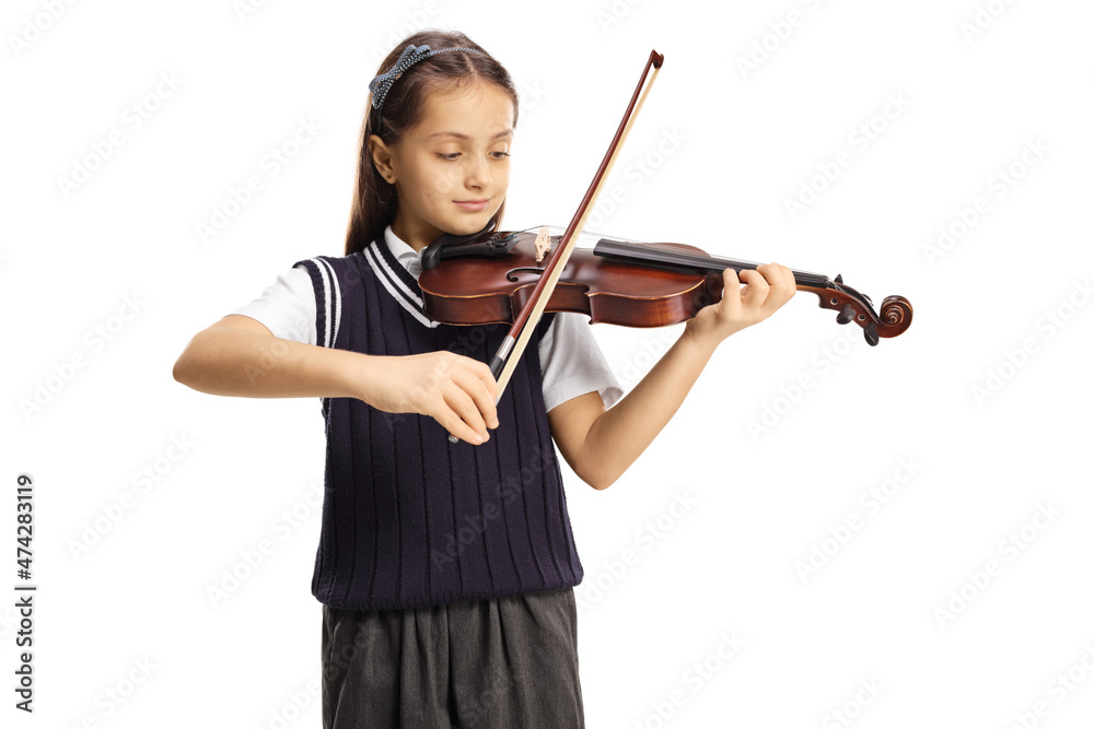 Beautiful young schoolgirl in a uniform playing a violin Beautiful young schoolgirl in a uniform playing a violin