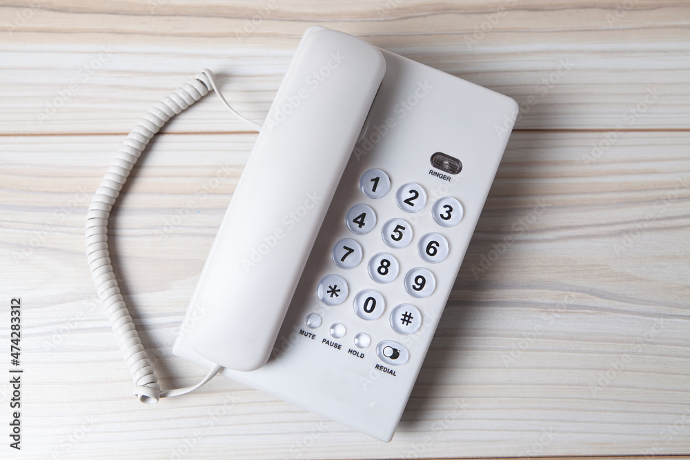 white home phone on the table white home phone on the table