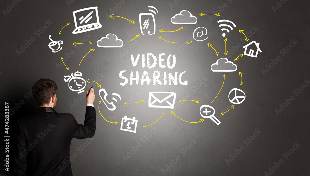 businessman drawing social media icons businessman drawing social media icons