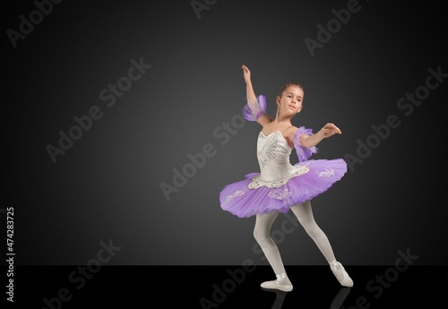 Ballerina. Young graceful woman ballet dancer, dressed in professional shoes
