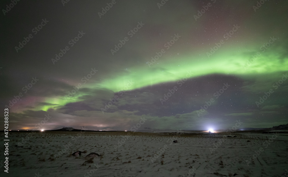 Northern lights (aurora borealis) over road 54, Iceland