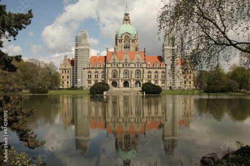 Hannover (Germany) Town hall "Neues Rathaus" seen over the garden lake on its backside, May 2021