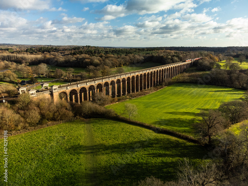 An aerial shot of the Ouse Valley Viaduct and surrounding landscape in the late afternoon sunlight photo