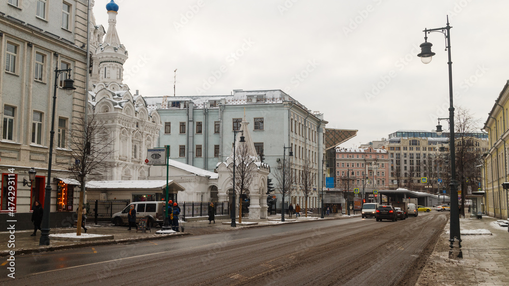 Moscow, Russia, Dec 02, 2021:  Malaya Dmitrovka street. Direction to Pushkinskaya square Church of the Nativity of the Theotokos at Putinki