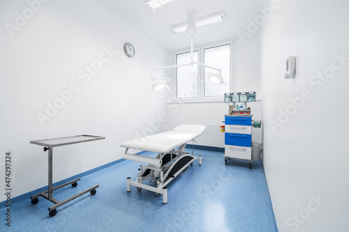 Clean and comfortable room in the hospital with examination table. Doctor's office. Doctor's room close up. Hospital check-ins.