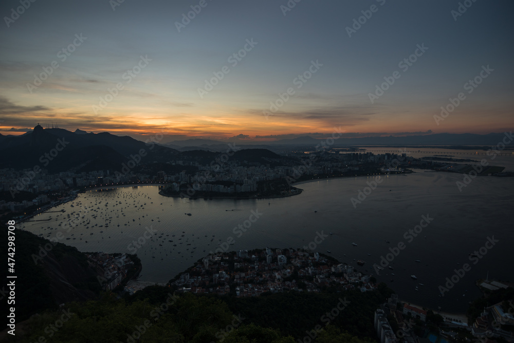 Rio de Janeiro, Brazil, April 2019 - Beautiful sunset view of Guanabara Bay and Urca neighborhood from a viewpoint at Sugarloaf Mountain 