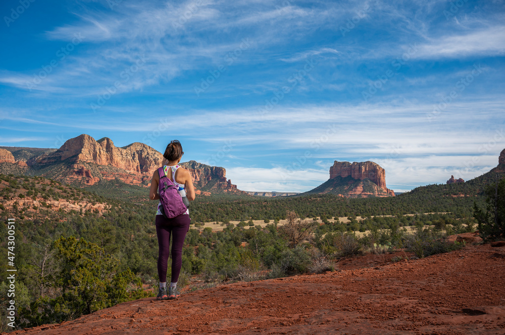 Woman hicking in Sedona at Red Rock county, Arizona