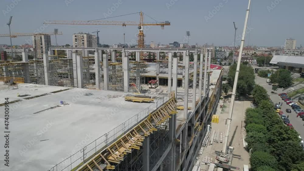 Aerial view on huge construction site with heavy equipment and workers. Aerial view on huge construction site with heavy equipment and workers.