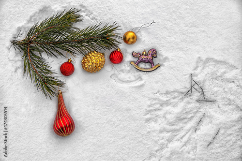 Christmas tree with decoration under snow. New Year composition with spruce and lights.Christmas tree background