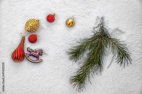 Christmas tree with decoration under snow. New Year composition with spruce and lights.Christmas tree background