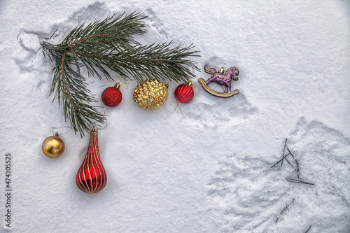 Christmas tree with decoration under snow. New Year composition with spruce and lights.Christmas tree background