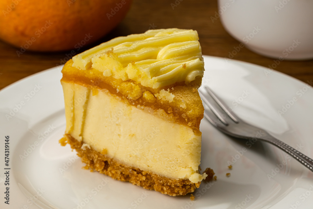 Closeup view of a portion of delicious homemade Lemon Cheesecake. Closeup view of a portion of delicious homemade Lemon Cheesecake.