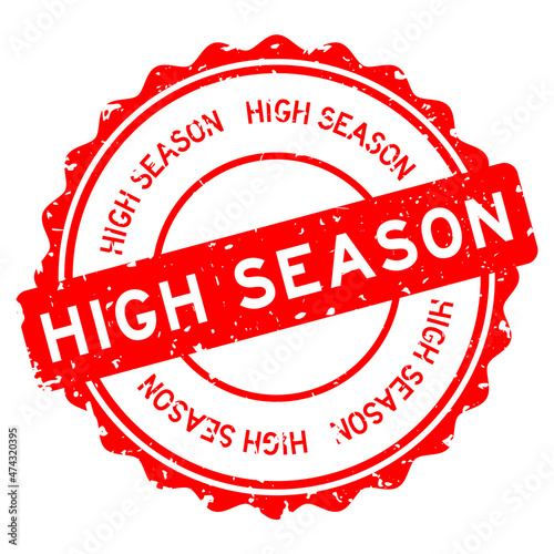 Grunge red high season word round rubber seal stamp on white background