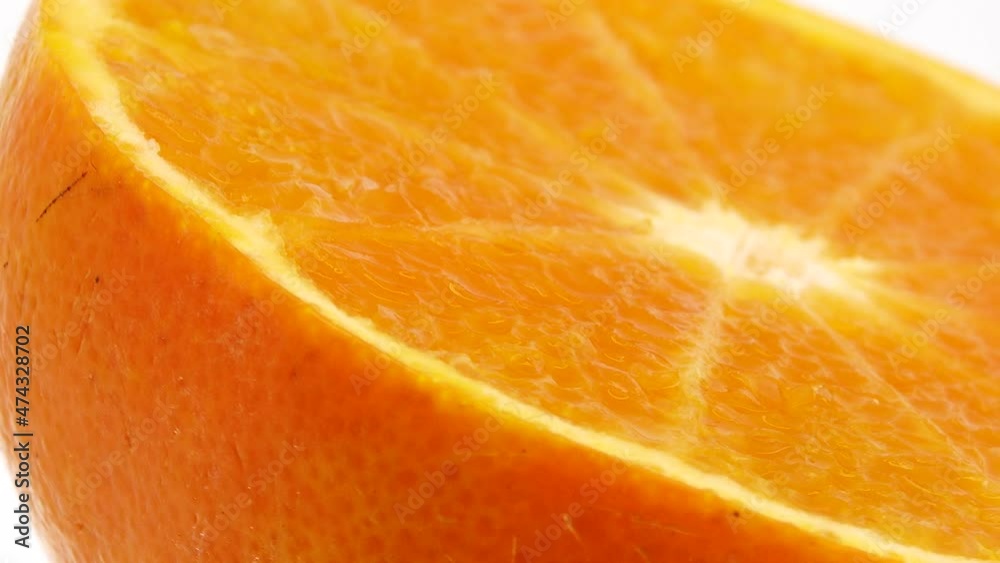 4K Macro shot of mandarin orange fruit and rotate.Close up fresh citrus orange isolated on white background 4K Macro shot of mandarin orange fruit and rotate.Close up fresh citrus orange isolated on white background