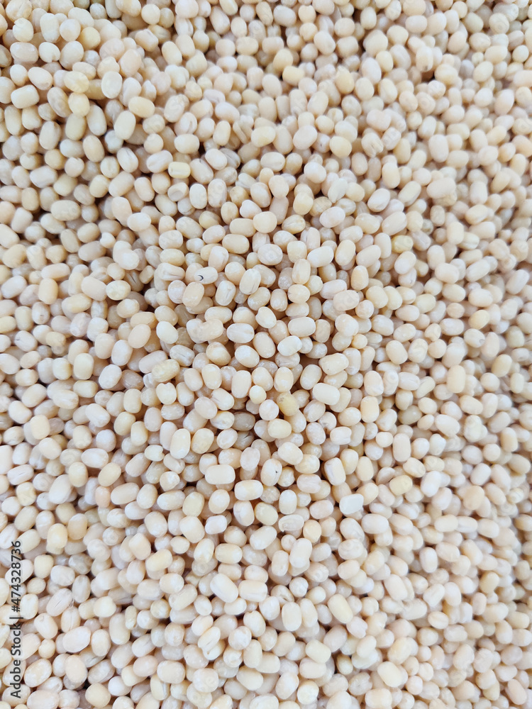 Urad dal, Peeled organic black gram seamless background. Urad dal, Peeled organic black gram seamless background.