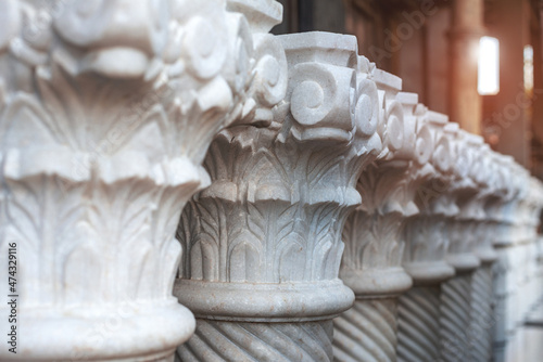 Classic antique Columns marble stone Courthouse or museum pillars looking straight up and symmetrical. Vintage Stone column ancient classic architecture and building detail concept Ideas