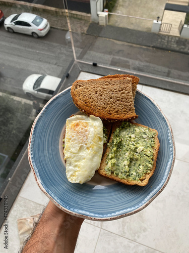 Tirokafteri on Bread with Poached Eggs. Girit Ezmesi. photo