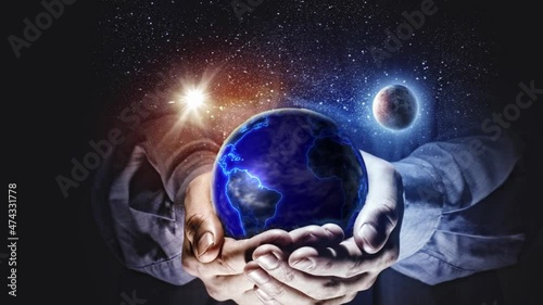 The planet rotates in the hands